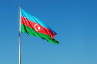 Azerbaijan flag on blue sky background