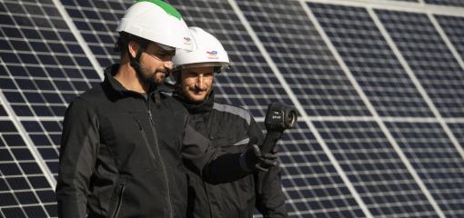 Employees at a solar power plant